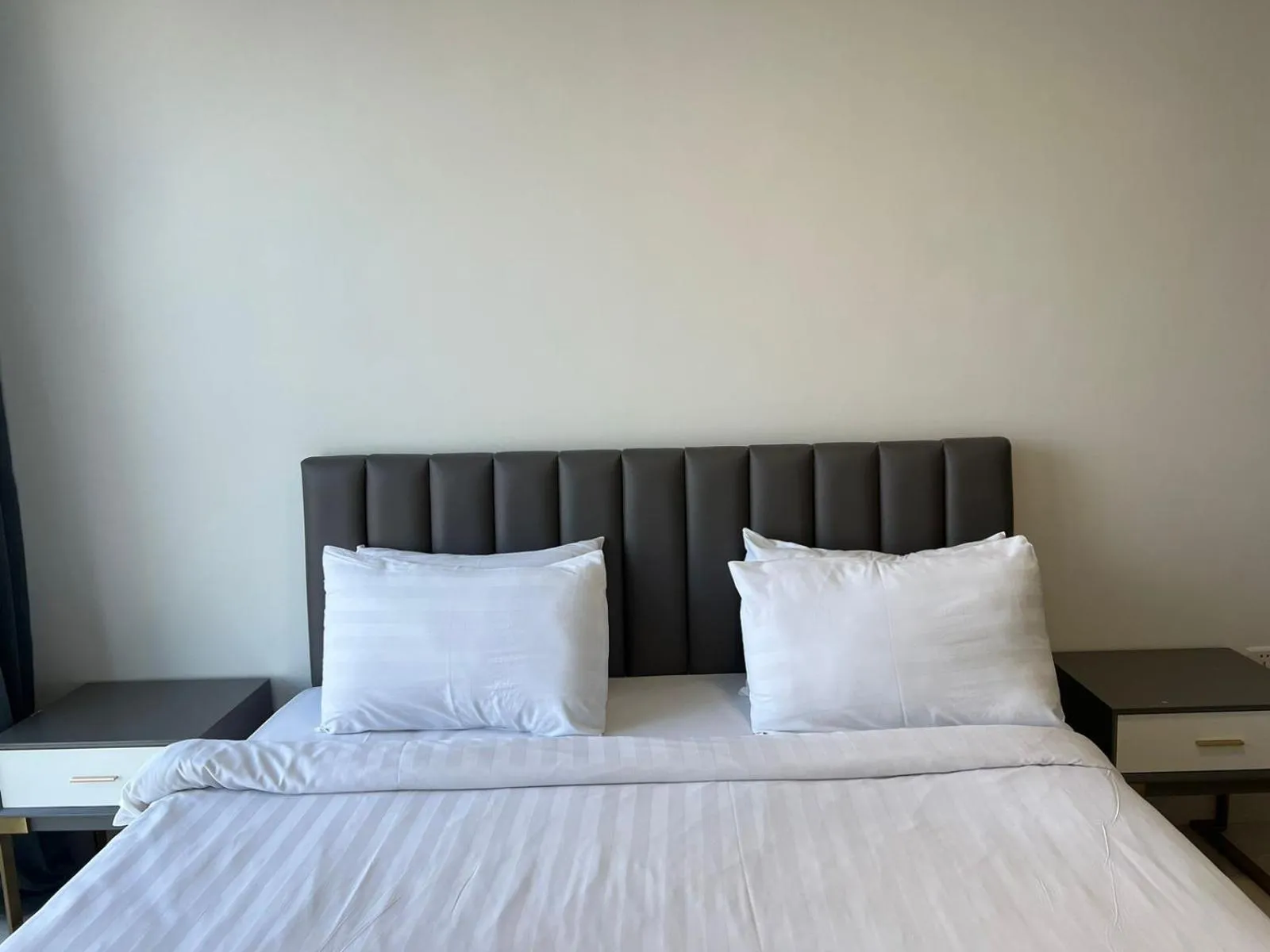 Bed in The PeAk Residence, Multi-Apartment by Emma