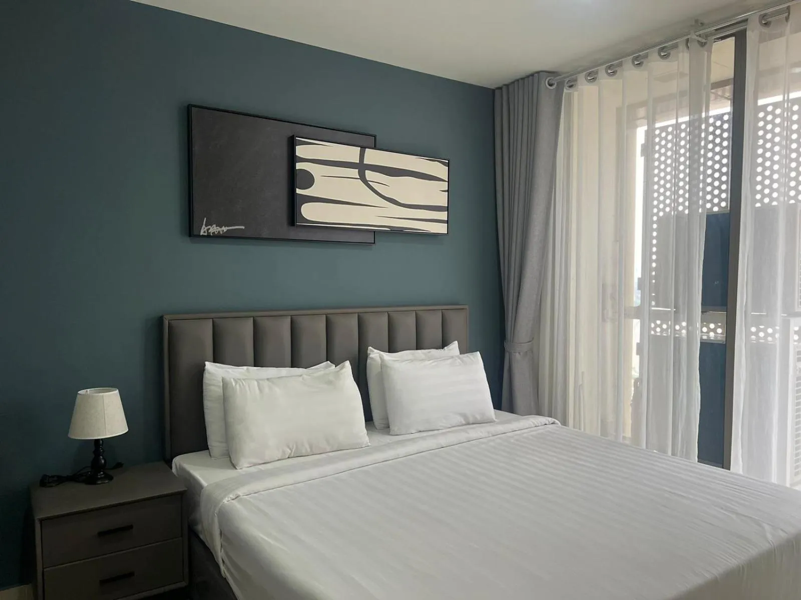 Bed in The PeAk Residence, Multi-Apartment by Emma