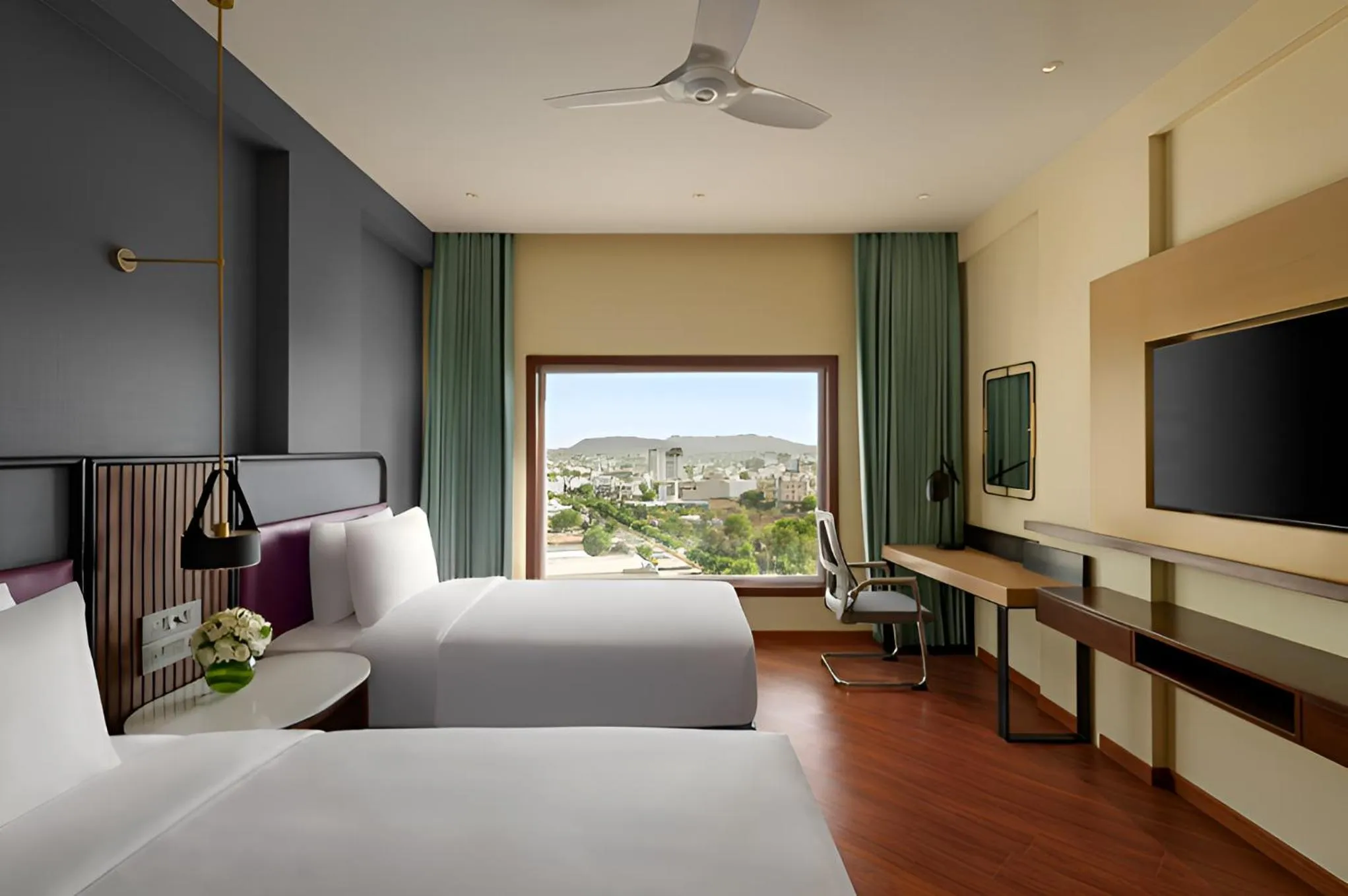 Bed in Ramada Encore by Wyndham Udaipur Roopnagar