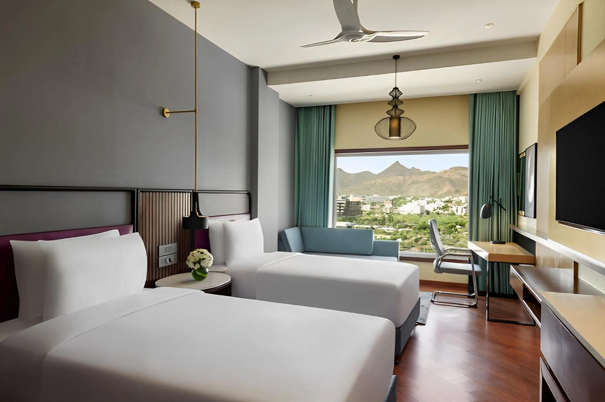 Bed in Ramada Encore by Wyndham Udaipur Roopnagar