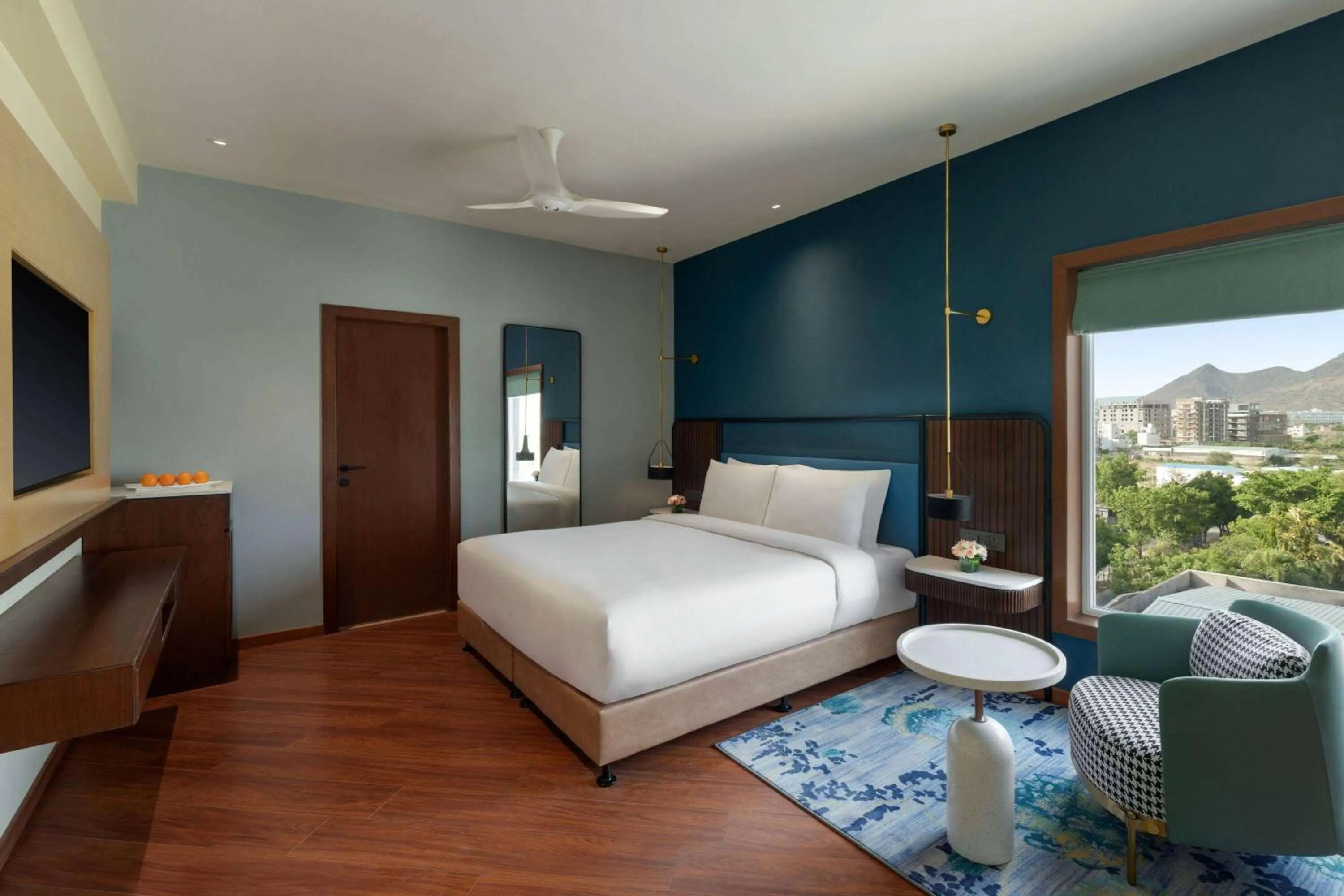 Photo of the whole room, Bed in Ramada Encore by Wyndham Udaipur Roopnagar