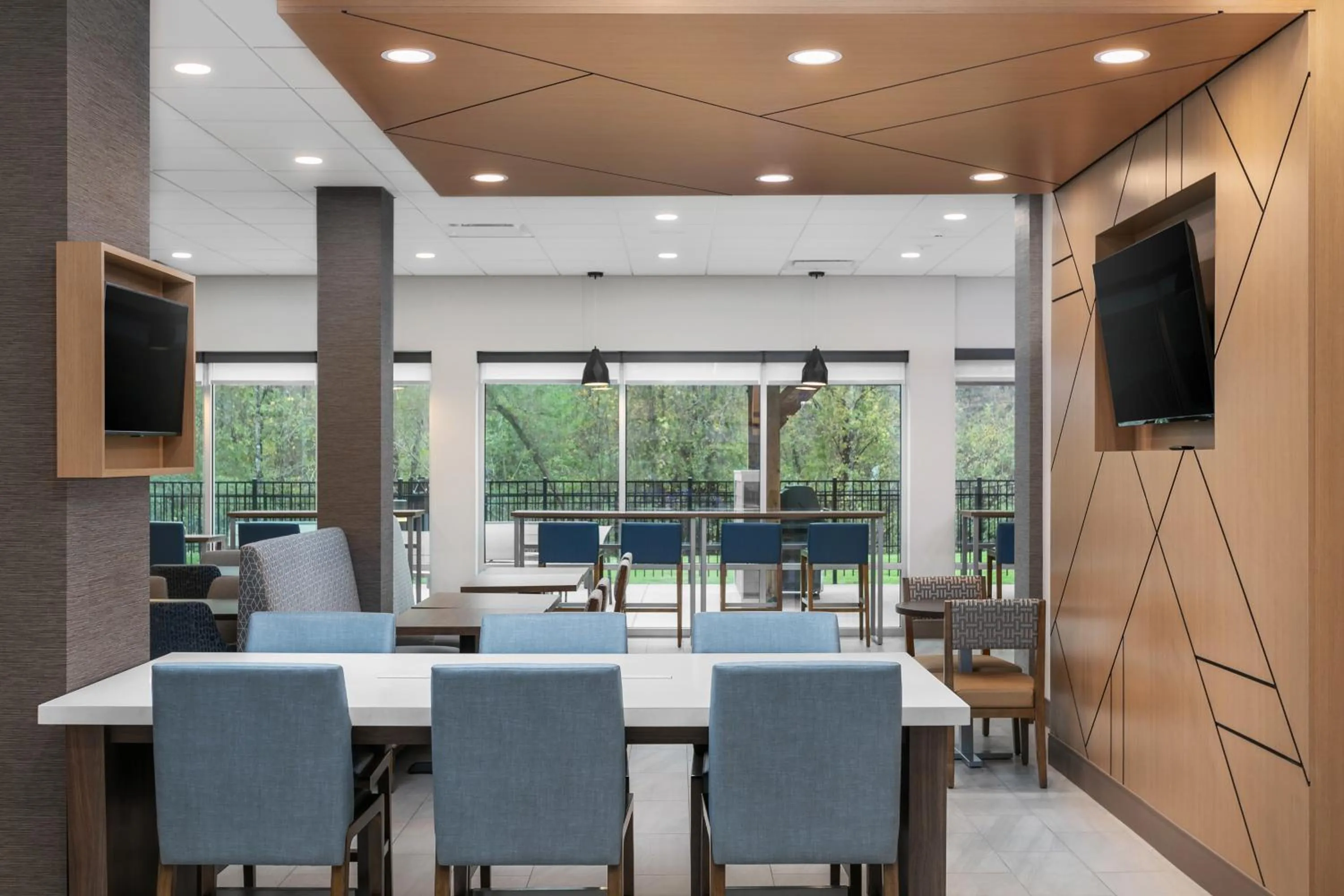 Seating area in Candlewood Suites Chattanooga Hamilton Place by IHG