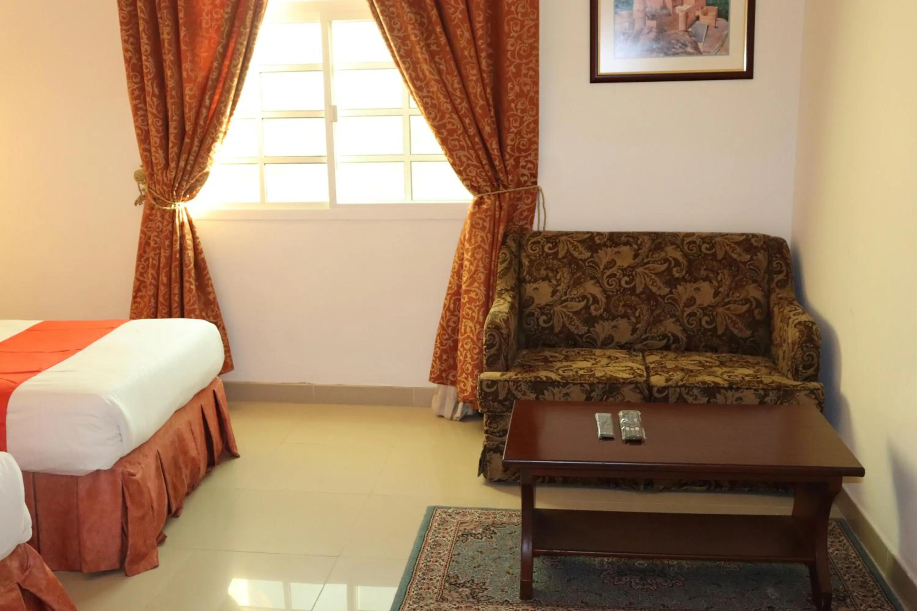 Bed in Dahlia Sohar Hotel Apartments