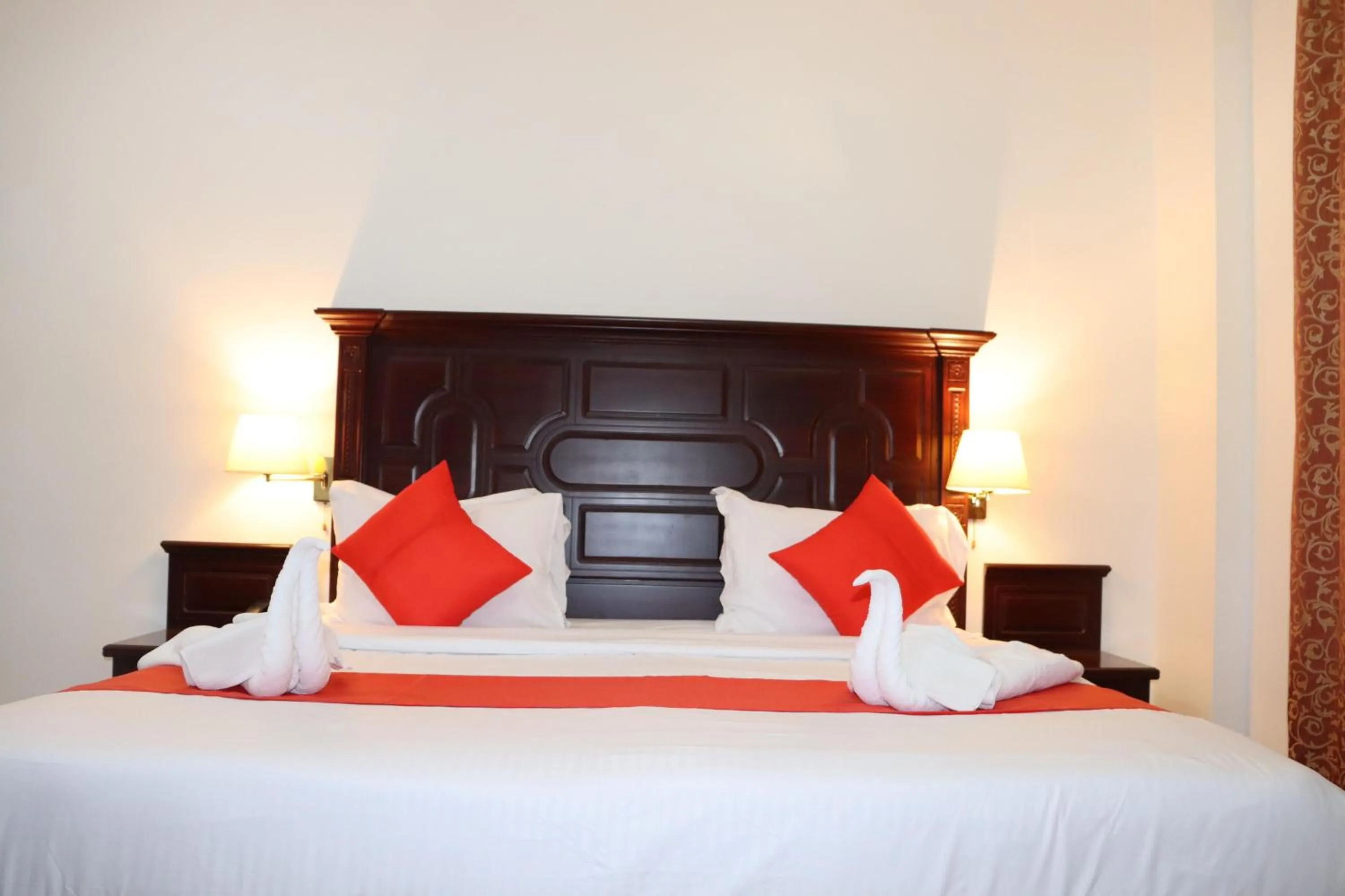 Bed in Dahlia Sohar Hotel Apartments