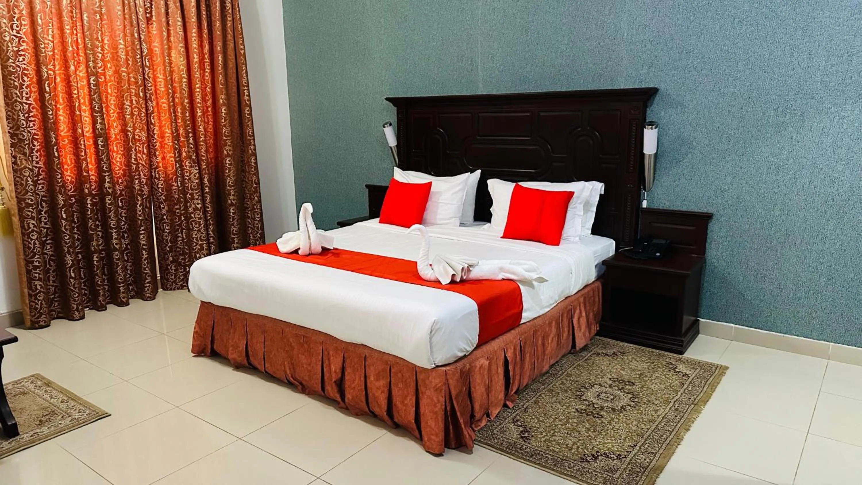 Bed in Dahlia Sohar Hotel Apartments
