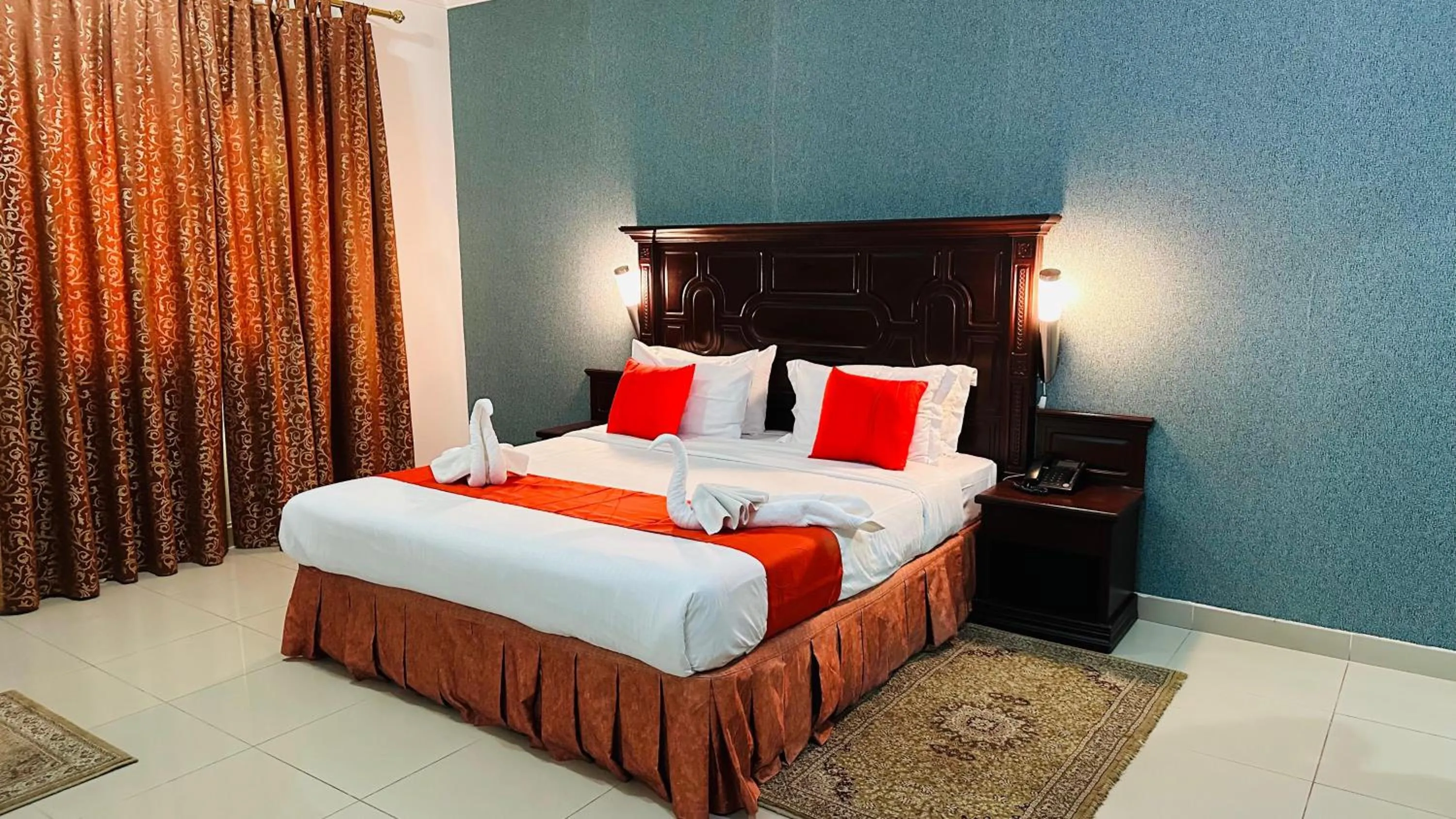 Bed in Dahlia Sohar Hotel Apartments