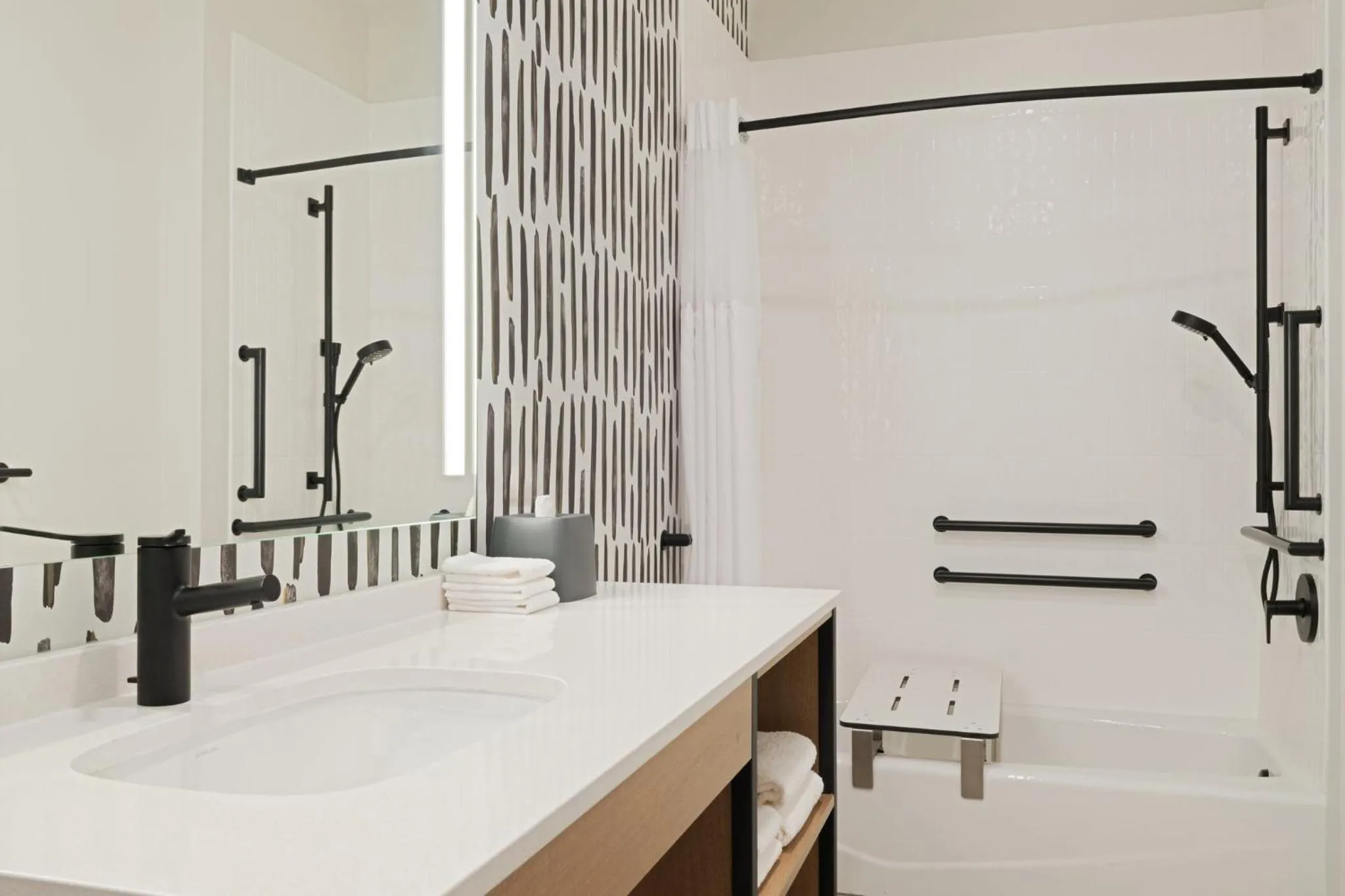 Bathroom in Atwell Suites Kansas City Airport by IHG