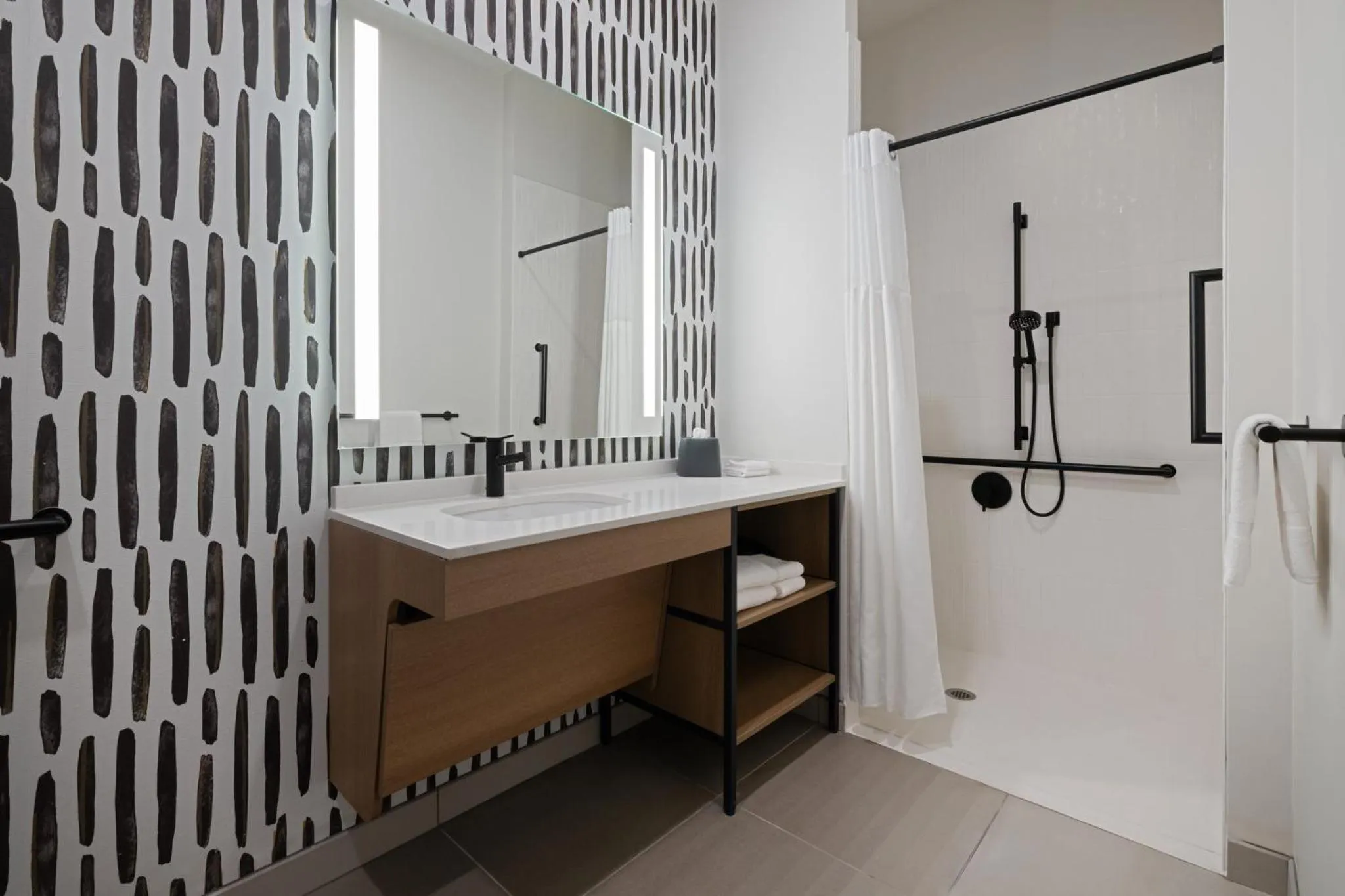 Bathroom in Atwell Suites Kansas City Airport by IHG