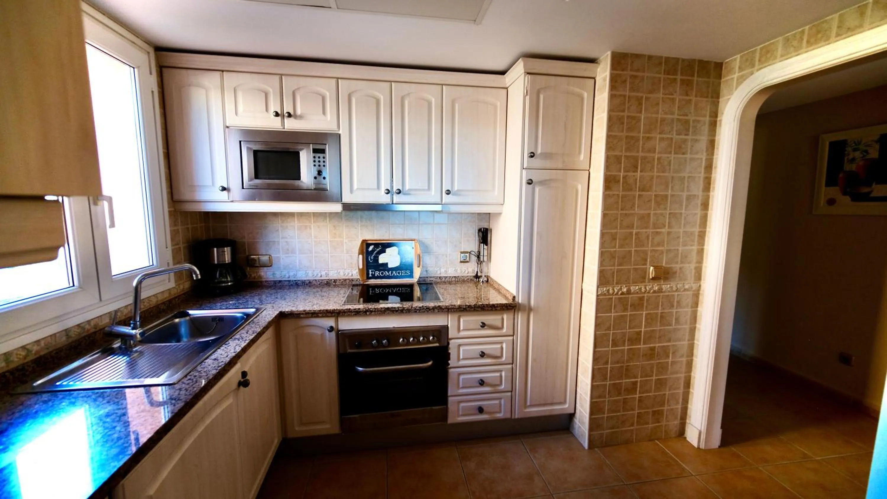 Kitchen or kitchenette in Marbella Beach Resort at Club Playa Real