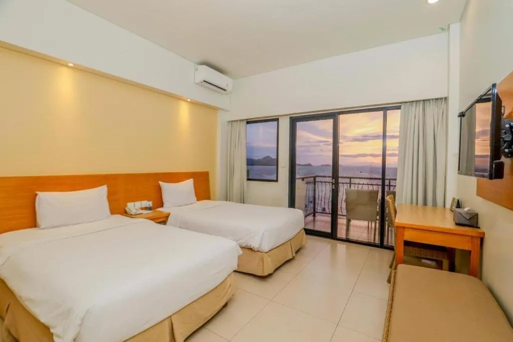 Bed in Laprima Hotel