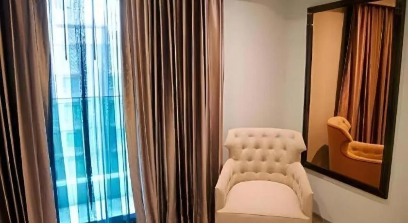 Bed in First Pride Hotel Bangkok