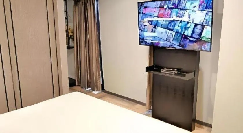 Bed in First Pride Hotel Bangkok