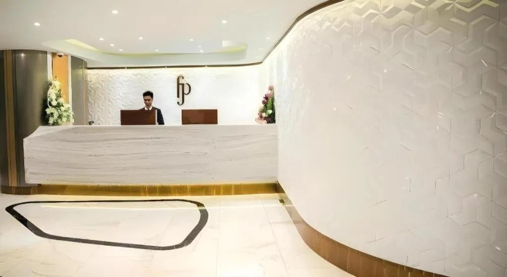 Bed in First Pride Hotel Bangkok