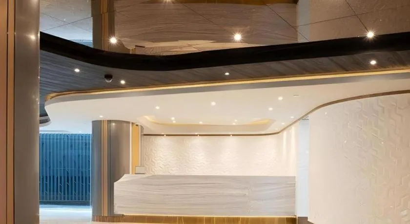 Bed in First Pride Hotel Bangkok