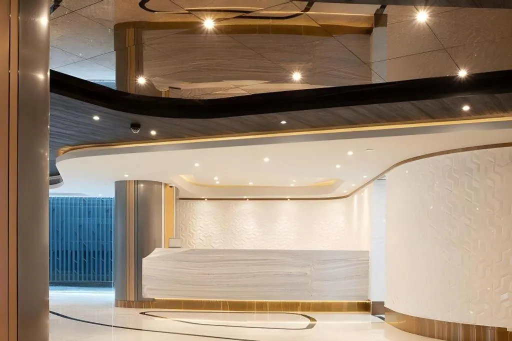 Bed in First Pride Hotel Bangkok