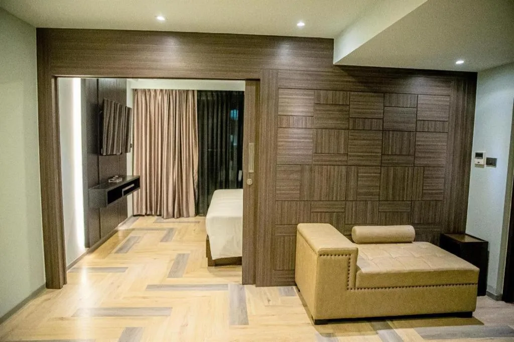 Bed in First Pride Hotel Bangkok