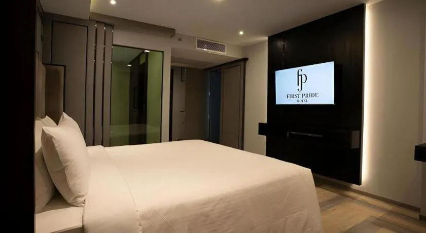 Bed in First Pride Hotel Bangkok