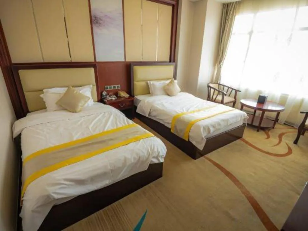 Bed in Grand Szechuan Hotel Vientiane