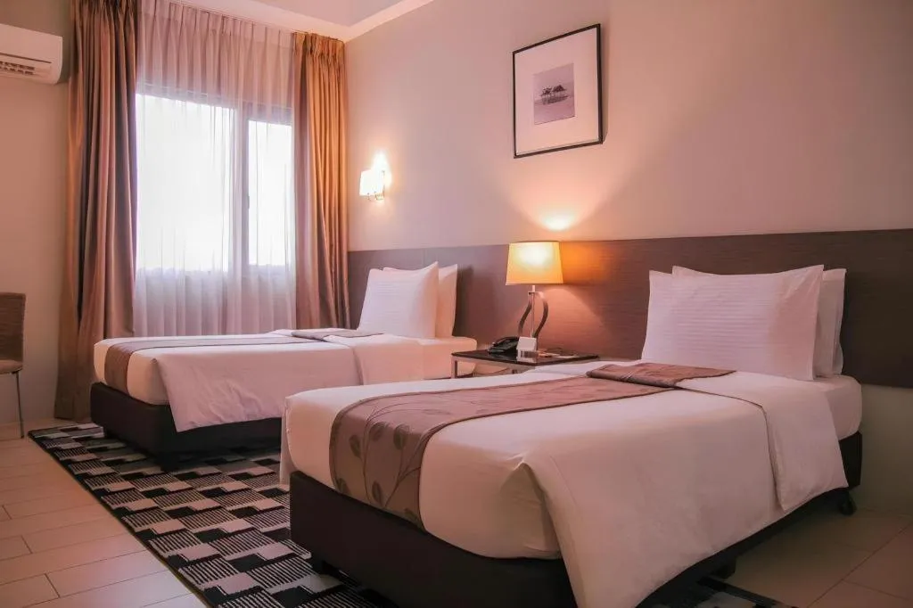 Bed in Sequoia Hotel Quezon City