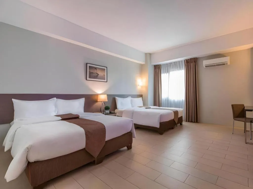 Bed in Sequoia Hotel Quezon City