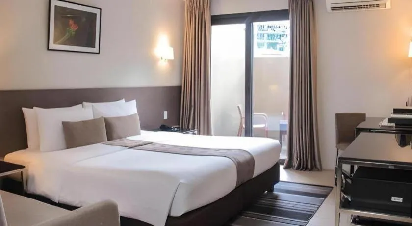 Bed in Sequoia Hotel Quezon City