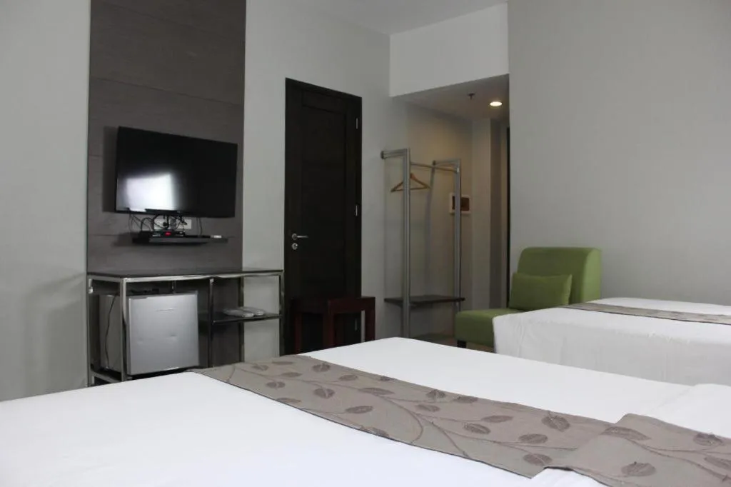 Bed in Sequoia Hotel Quezon City