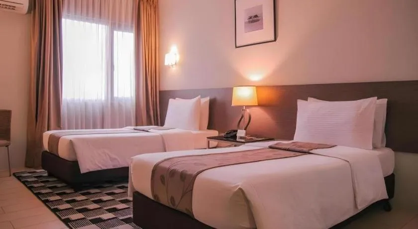 Bed in Sequoia Hotel Quezon City