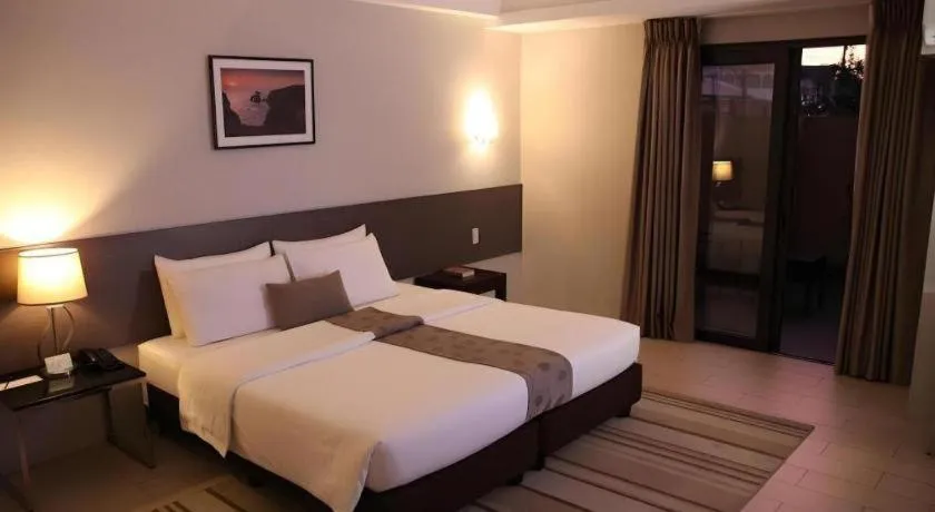 Bed in Sequoia Hotel Quezon City