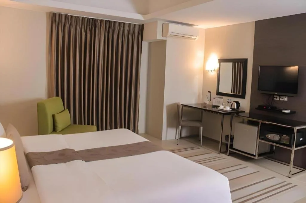 Bed in Sequoia Hotel Quezon City