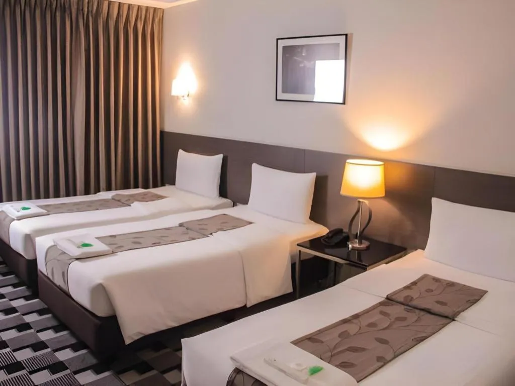 Bed in Sequoia Hotel Quezon City