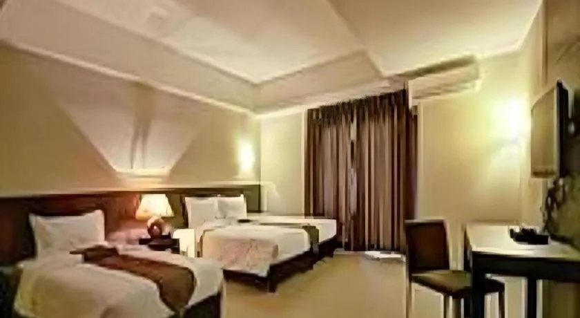 Bed in Sequoia Hotel Quezon City