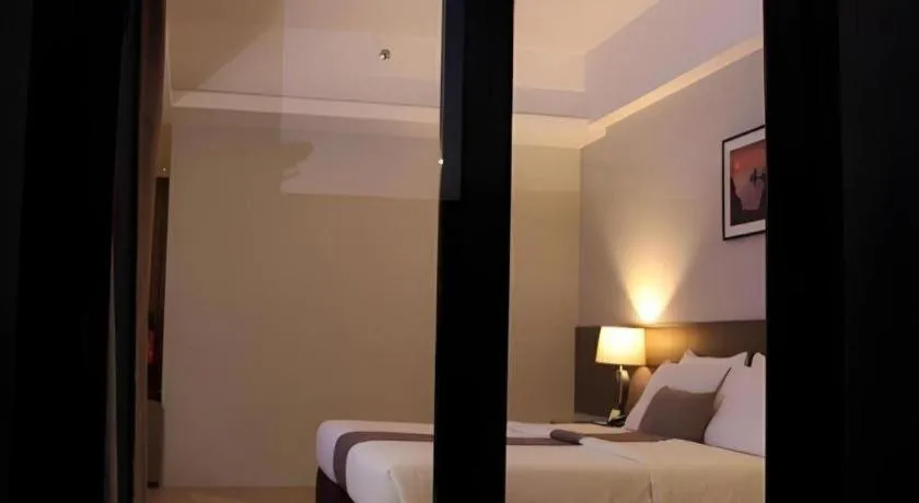 Bed in Sequoia Hotel Quezon City