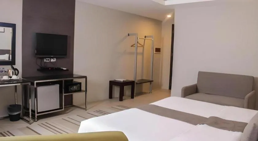 Bed in Sequoia Hotel Quezon City