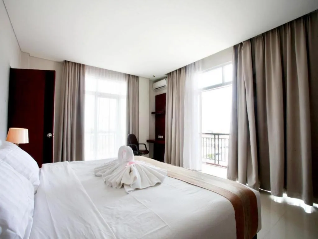 Bed in Karlita Hotel Tegal