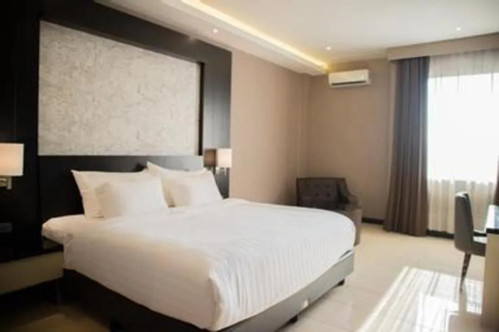 Bed in Karlita Hotel Tegal