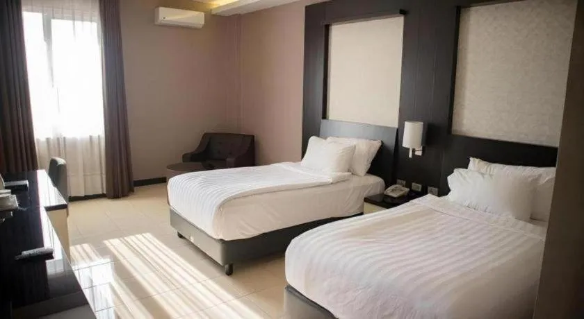 Bed in Karlita Hotel Tegal