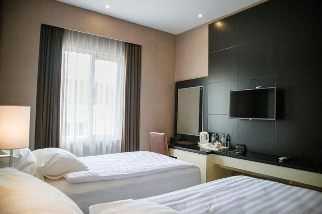 Bed in Karlita Hotel Tegal