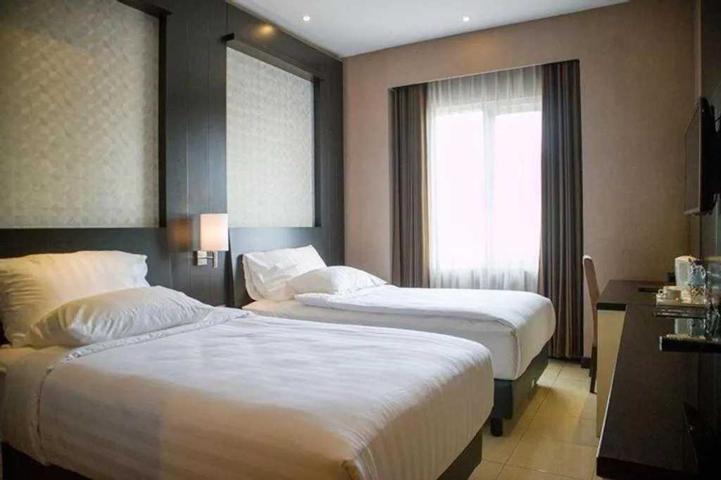 Bed in Karlita Hotel Tegal