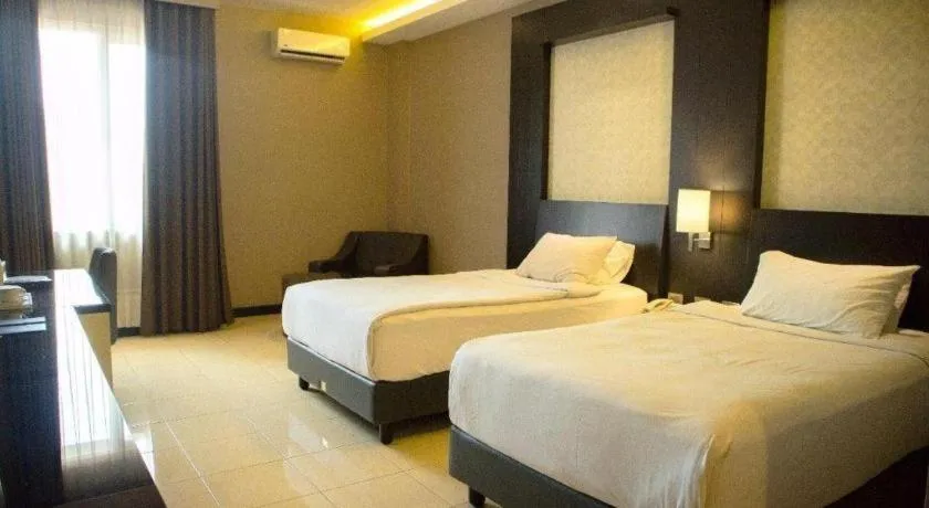 Bed in Karlita Hotel Tegal