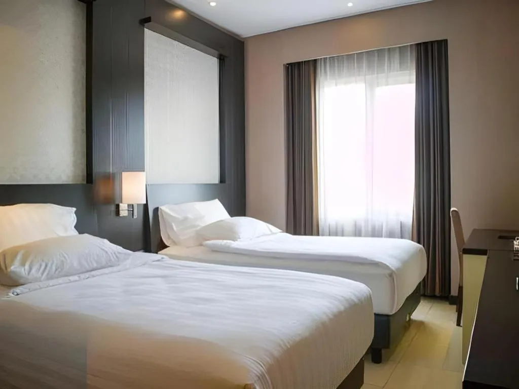 Bed in Karlita Hotel Tegal