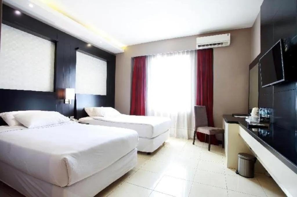 Bed in Karlita Hotel Tegal