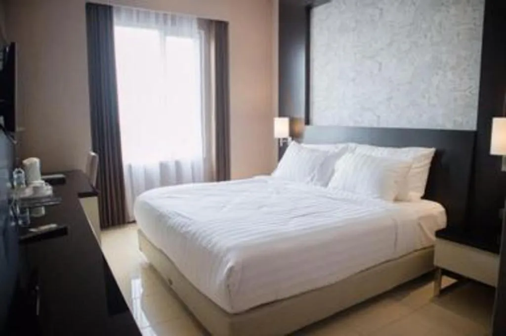 Bed in Karlita Hotel Tegal