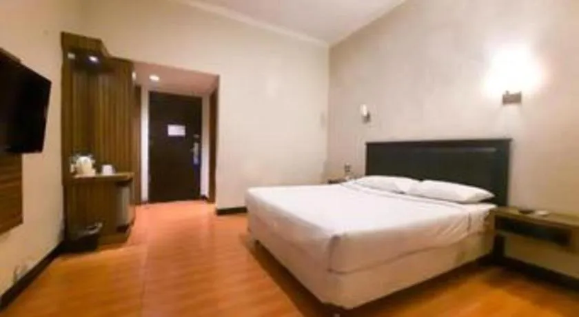 Bed in Karlita Hotel Tegal