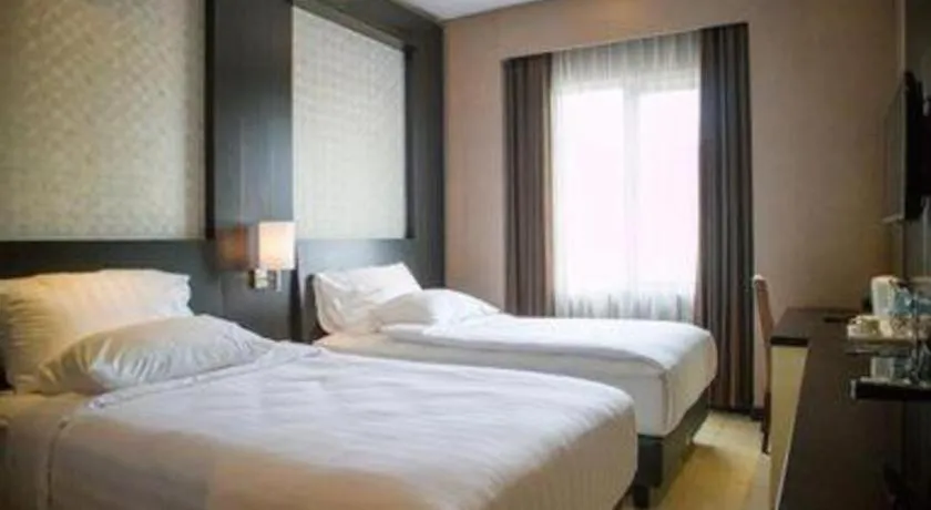 Bed in Karlita Hotel Tegal