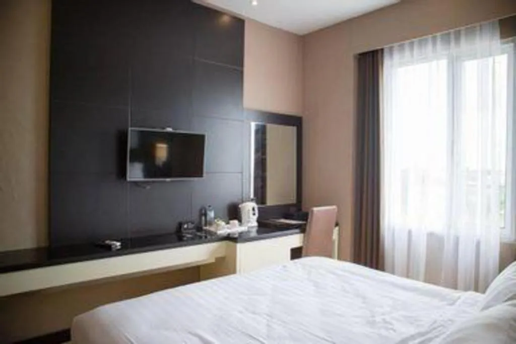 Bed in Karlita Hotel Tegal