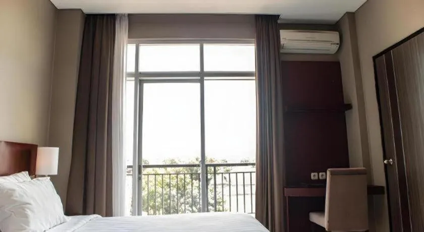 Bed in Karlita Hotel Tegal