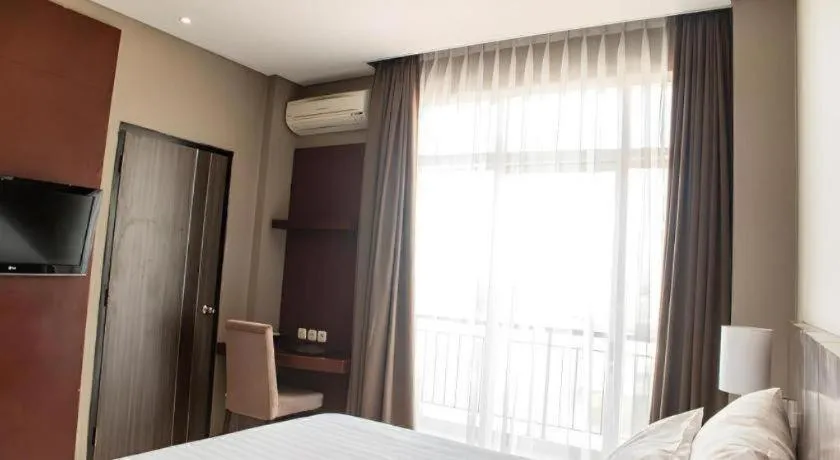Bed in Karlita Hotel Tegal