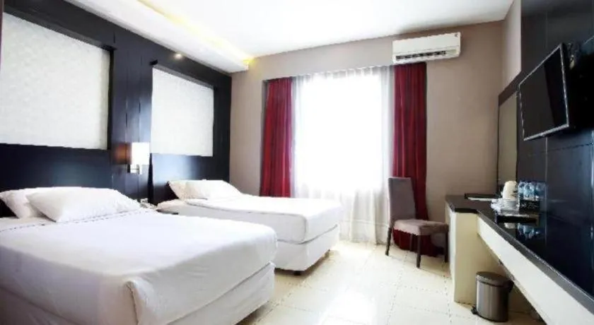 Bed in Karlita Hotel Tegal