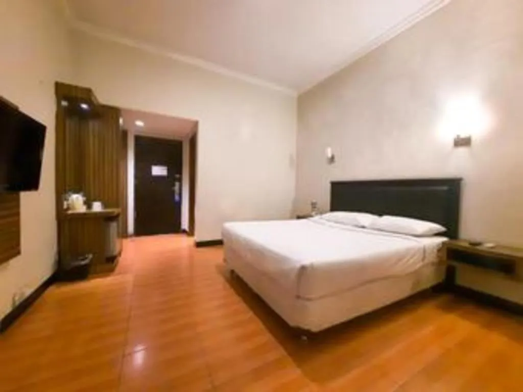 Bed in Karlita Hotel Tegal