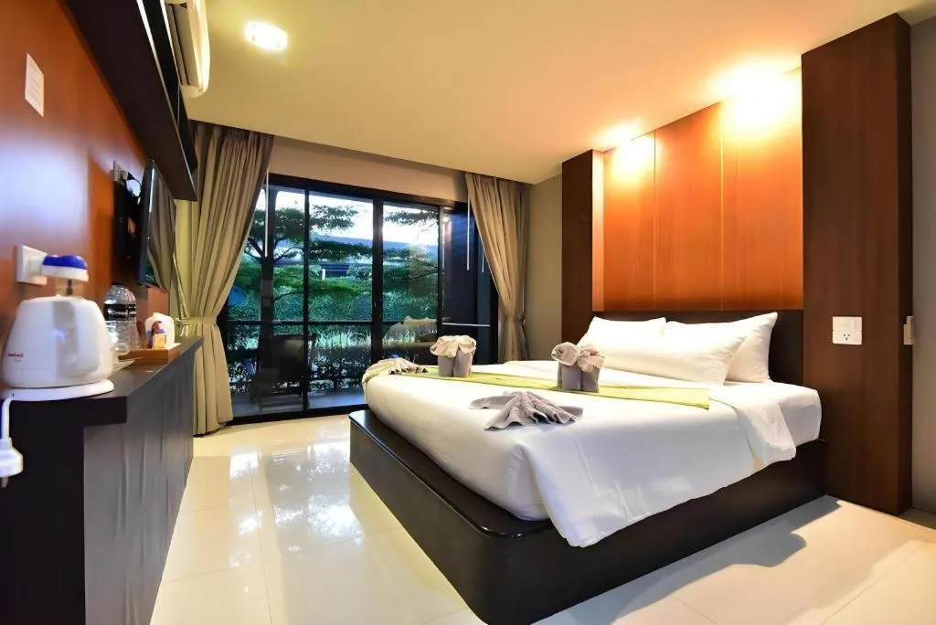 Bed in The Breeze Lipe Resort